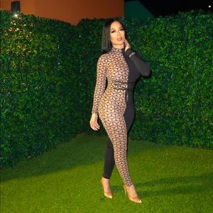 Black one piece half sheer in great condition. Just needs another great home.